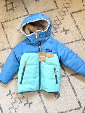 Patagonia Kids Two-Tone Light and Sky Blue baby reversible tribales jacket